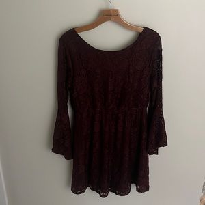 Maroon dress,  above the knee.